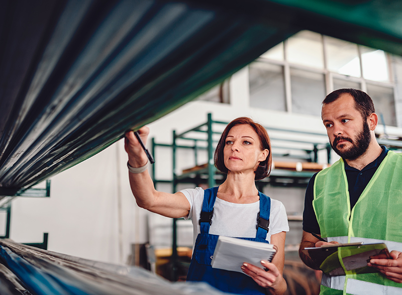 Order picker collecting products in the warehouse