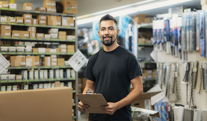 A Mechanics with merchandiser checking products availibility