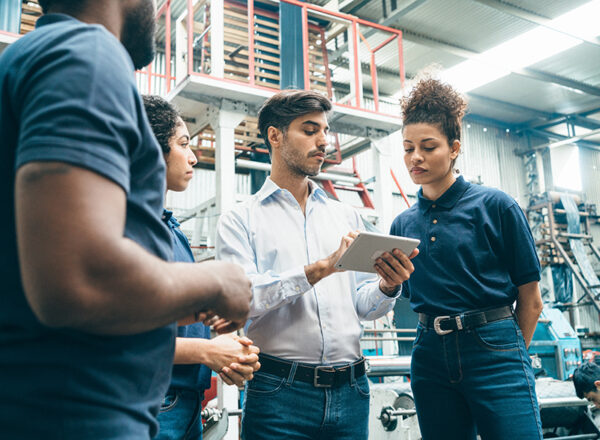 Team meeting on the plastic recycling factory